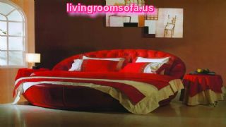 Decorating A Bedroom Around With A Red Round Bed Round Bed