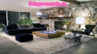 Excellent Living Room Furniture Design Ideas With Fireplace And Black Sofa On Cream Fur Rug Also Stone Walls As Well As Delightful Lighting