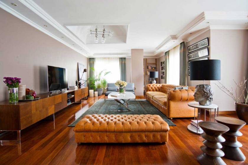 Brown leather chesterfield sofa and pouf luxury leather living room