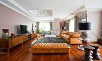 Brown leather chesterfield sofa and pouf luxury leather living room