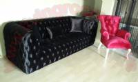 Red velvet unique chair and black quilted couch design Elegant Interior Design