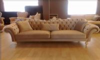 beige chesterfield sofa