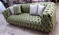 green fabric chesterfield sofa