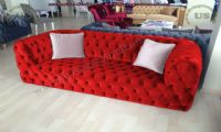 red velvet decorative chesterfield couch