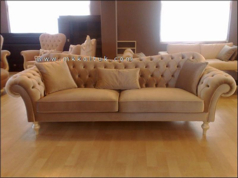 beige chesterfield sofa