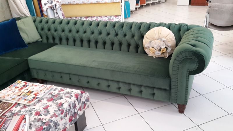 green l shaped chesterfield